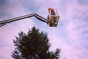 Bill Asack maneuvers ariel lift into position