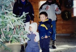 Christmas Tree Customers next to candy cane tree